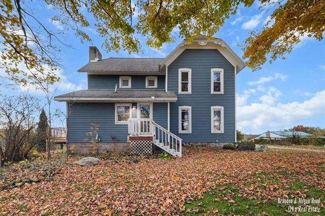 front view picture of 7658 Jackson Road, Saranac, MI. 48881