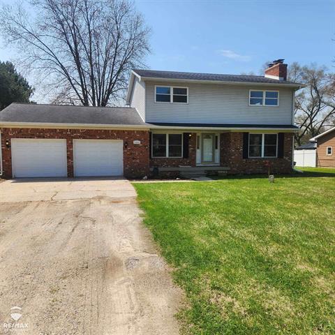 front view picture of 9881 M-21, Ovid, MI. 48866