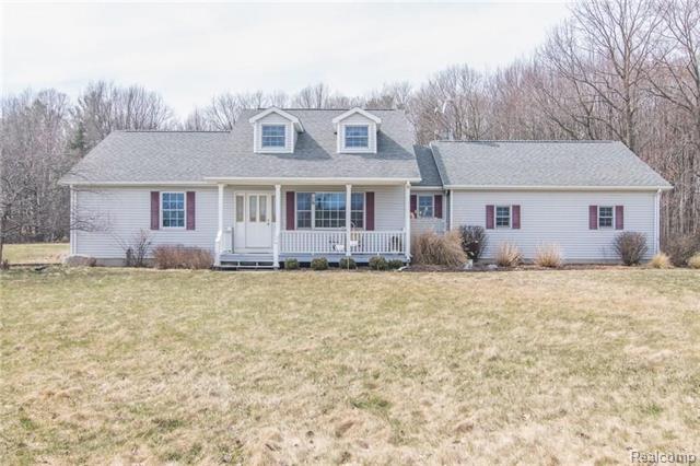 front view picture of 7731 N Musson, Six Lakes, MI. 48886