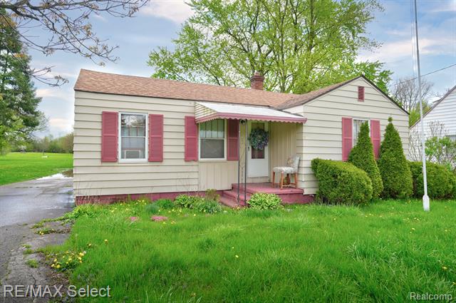 front view picture of 1503 S Belsay Road, Burton, MI. 48509