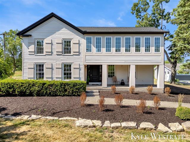 front view picture of 7761 Leonard Road, Coopersville, MI. 49404