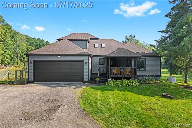 front view picture of 61353 W 8 Mile Road, South Lyon, MI. 48178