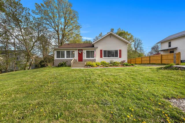 front view picture of 220 W Divisionne  Street, Rockford, MI. 49341