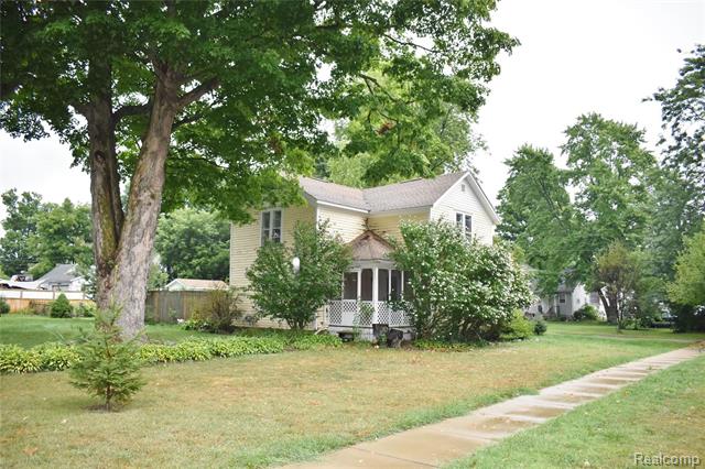 front view picture of 223 S Summit Street, Webberville, MI. 48892