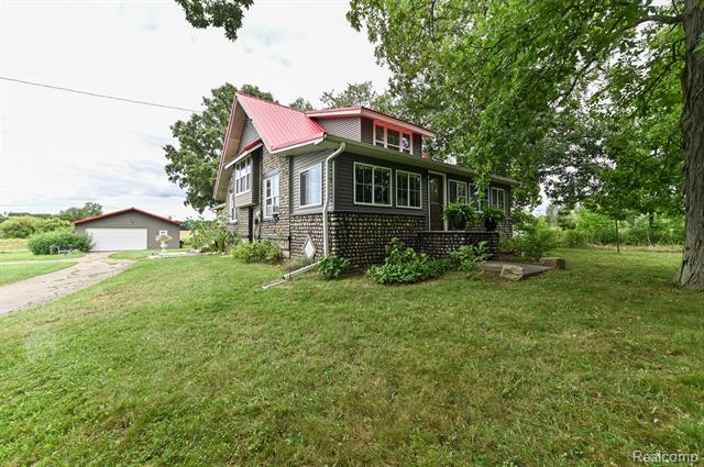 front view picture of 11219 Dodge Road, Otisville, MI. 48463