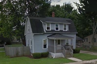 front view picture of 205 School Street, Almont, MI. 48003
