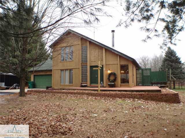 front view picture of 2197 Haslett Road, Williamston, MI. 48895