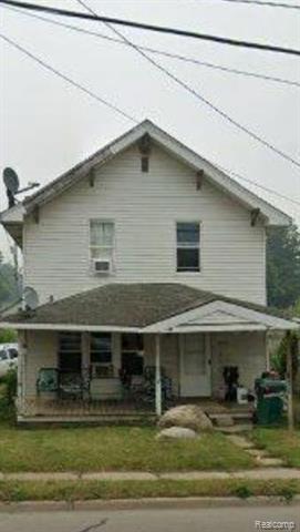 front view picture of 11630 N Saginaw Street, Mount Morris, MI. 48458