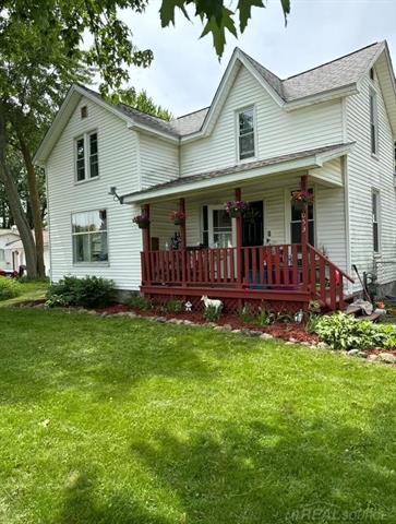 front view picture of 6053 Van Dyke Road, Brown City, MI. 48416
