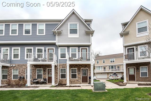 front view picture of 587 Anne Avenue, Brighton, MI. 48116