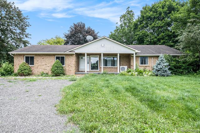 front view picture of 6695 River Road, Flushing, MI. 48433