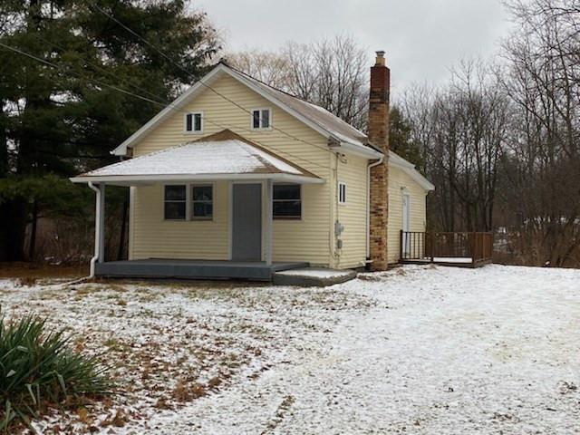 front view picture of 345 Woodland Ave, Jackson, MI. 49203