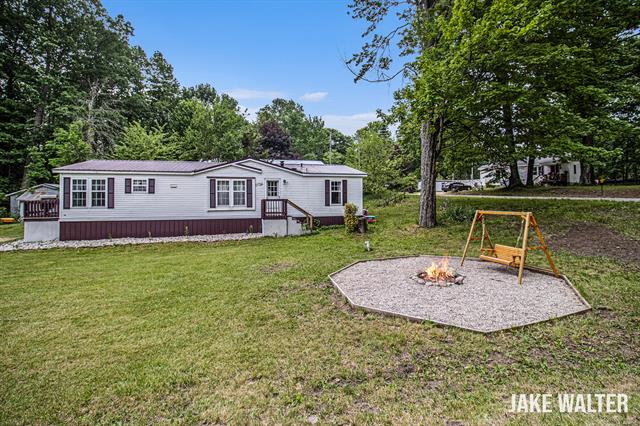 front view picture of 11720 Sparrow Drive, Lakeview, MI. 48850