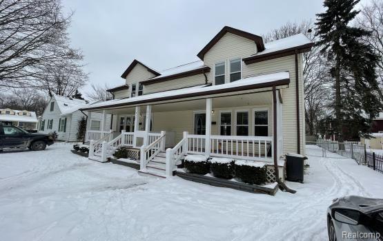front view picture of 217 Madison Street, Howell, MI. 48843