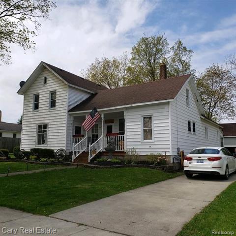 front view picture of 6170 Fulton Street, Mayville, MI. 48744