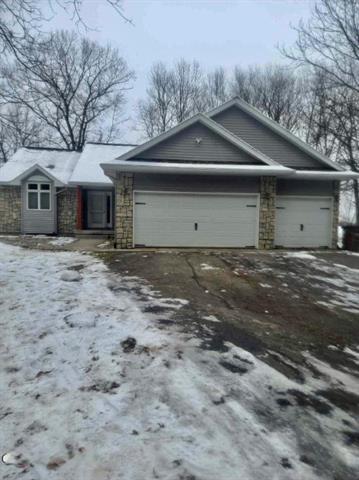 front view picture of 12869 Links Lane, Gowen, MI. 49326
