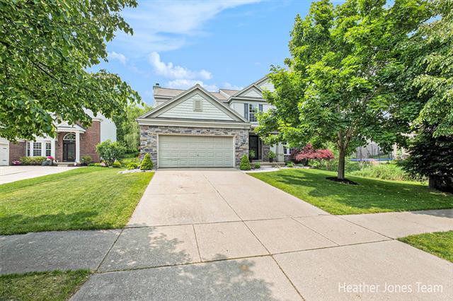 front view picture of 587 Legacyne  Court, Rockford, MI. 49341