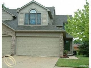 front view picture of 45209 Horseshoe Circle, Canton, MI. 48187
