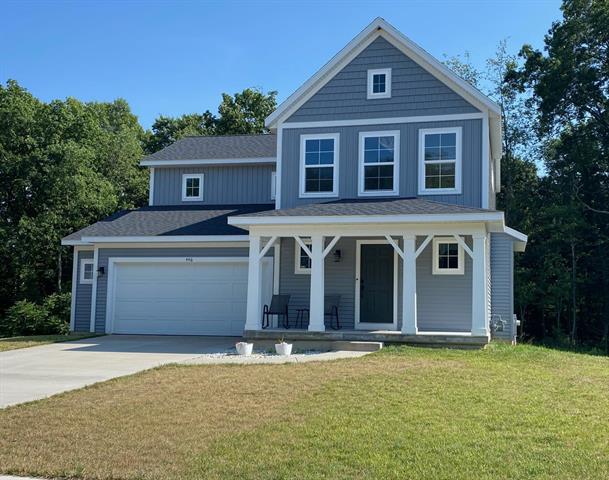 front view picture of 446 Windchime, Comstock Park, MI. 49321