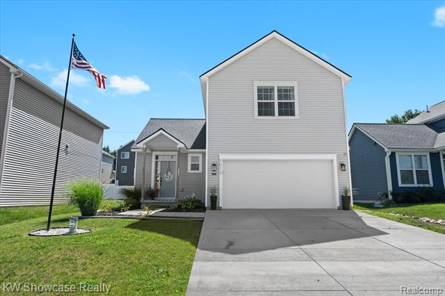 front view picture of 5013 Walsh, Brighton, MI. 48114