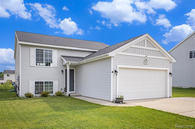 front view picture of 1214 Kennybrook Lane, Howell, MI. 48843