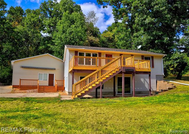 front view picture of 6588 Wells Rd, Jackson, MI. 49201