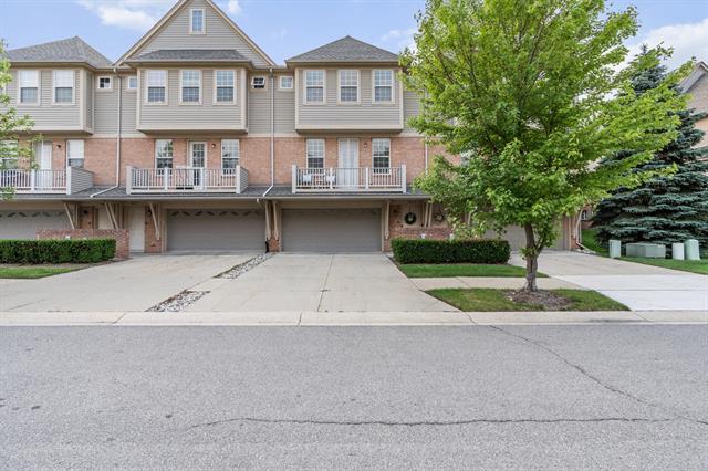 front view picture of 56643 Sunset Drive, Shelby Township, MI. 48316