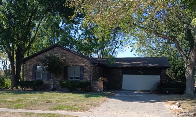 front view picture of 334 W Winds Drive, Almont, MI. 48003