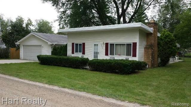 front view picture of 7278 Maple Road, Lexington, MI. 48450