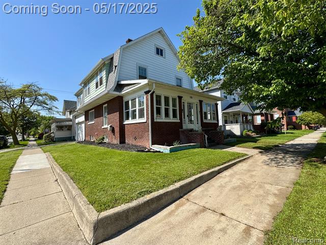 front view picture of 128 Cass St, Monroe, MI. 48161