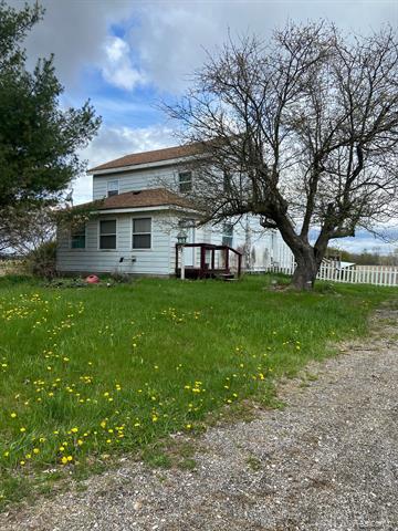 front view picture of 944 Garfield Road, Fostoria, MI. 48435