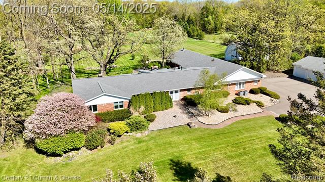 front view picture of 22340 Natasha Lane, South Lyon, MI. 48178