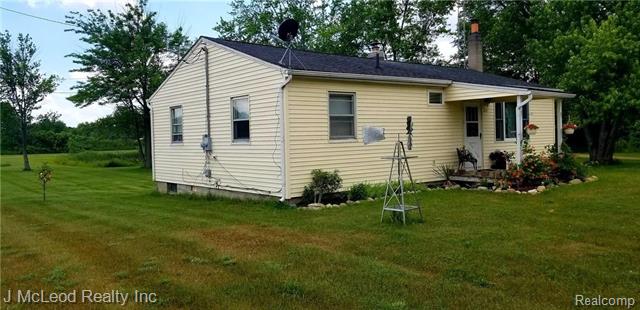 front view picture of 4255 Otter Lake Road, Otter Lake, MI. 48464