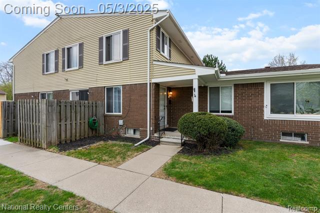 front view picture of 24022 Quad Park, Clinton Township, MI. 48035