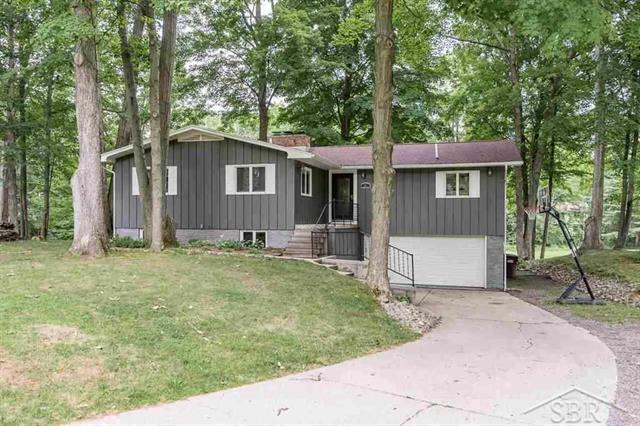 front view picture of 667 E Whitethorn Dr, Midland, MI. 48640
