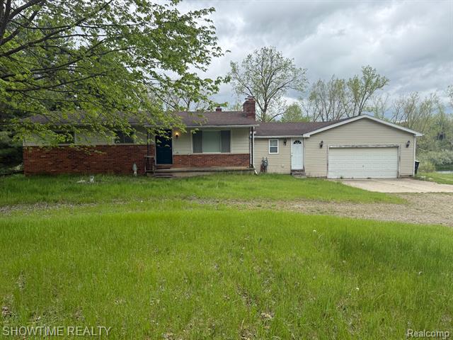 front view picture of 1666 Kile Road, Metamora, MI. 48455
