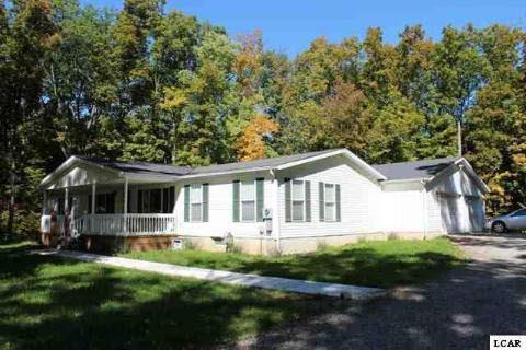 front view picture of 5718 Hunt Rd, Adrian, MI. 49221