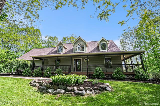 front view picture of 8315 Woodland Cir, Goodrich, MI. 48438