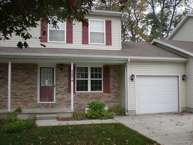 front view picture of 1452 Whispering Woods, Marysville, MI. 48040