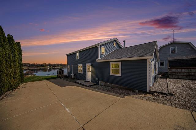 front view picture of 417 Wolf Lake Road, Brooklyn, MI. 49230