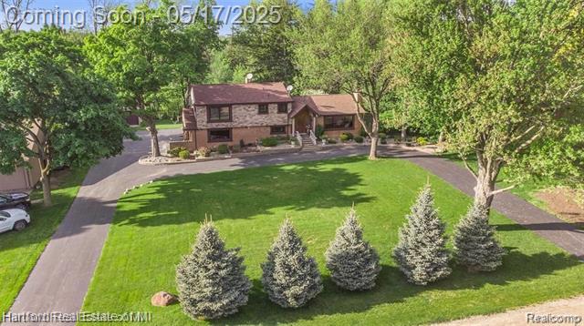 front view picture of 26336 Pillsbury St, Farmington, MI. 48334