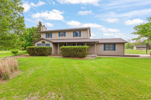 front view picture of 9705 Crescent Ct, Tecumseh, MI. 49286