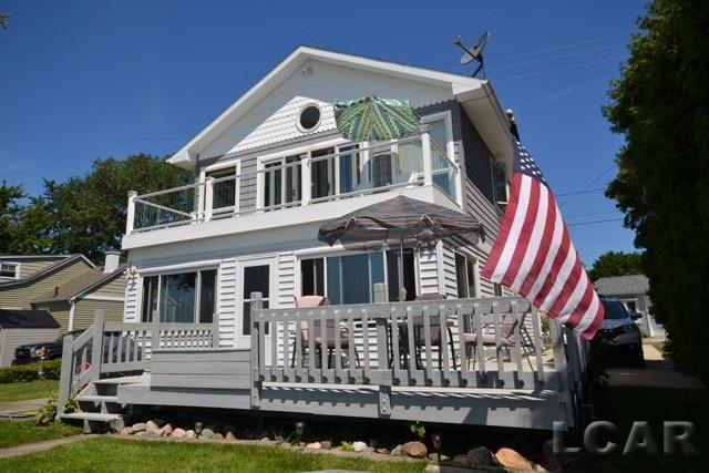 front view picture of 10240 Ferndale Drive, Manitou Beach, MI. 49253