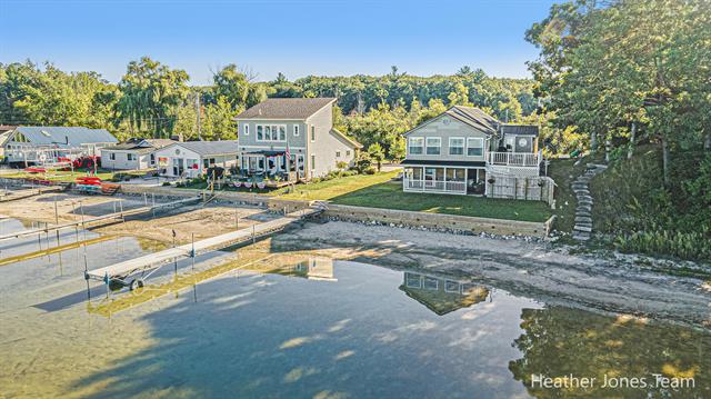 front view picture of 16375 Bass Lake Avenue, Gowen, MI. 49326