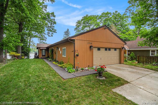 front view picture of 1704 Clark Lake Road, Brighton, MI. 48114