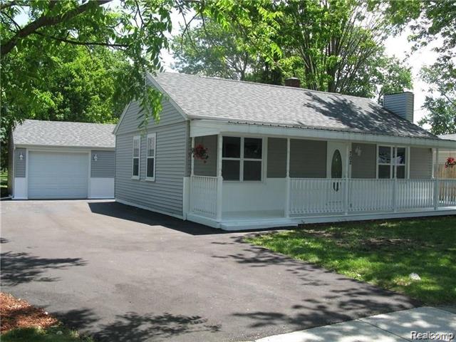 front view picture of 702 Oda Street, Davison, MI. 48423