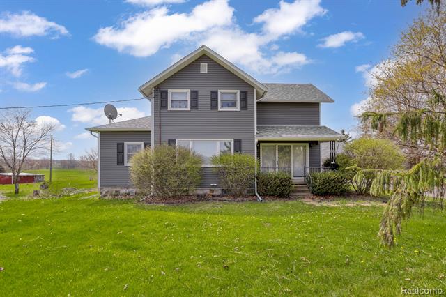 front view picture of 10639 W Mason Road, Fowlerville, MI. 48836