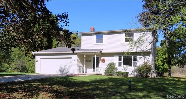 front view picture of 10095 Carlee June Drive, Fenton, MI. 48430