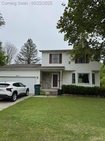 front view picture of 303 S Saginaw Street, Lapeer, MI. 48446