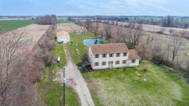 front view picture of 10691 N County Line Road, Milan, MI. 48160